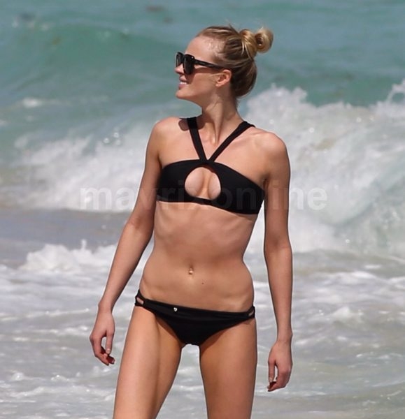 Jessica Hart shows off her figure at the beach with 